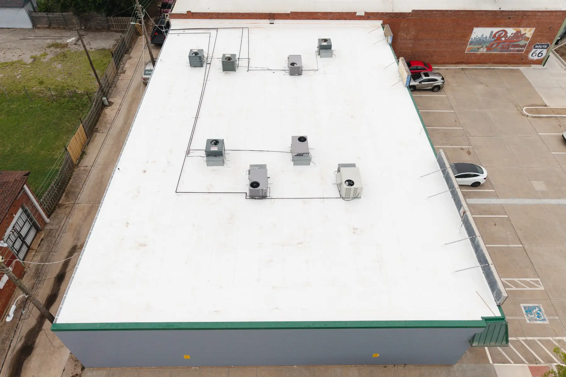 Top-down drone view of Britton District flat commercial roof